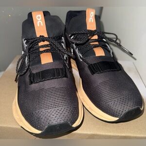 On Running Women's Black Sneakers with Tan Accents